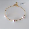 Lady's 18K Diamond Cut Bangle with Pearl
