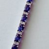 18K Oval Cut Sapphire and Diamond Tennis Bracelet